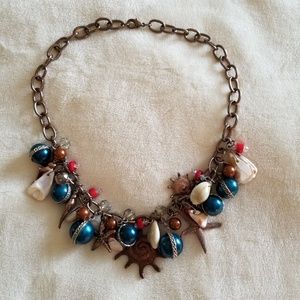 Copper tone seashell and beach theme 20" necklace